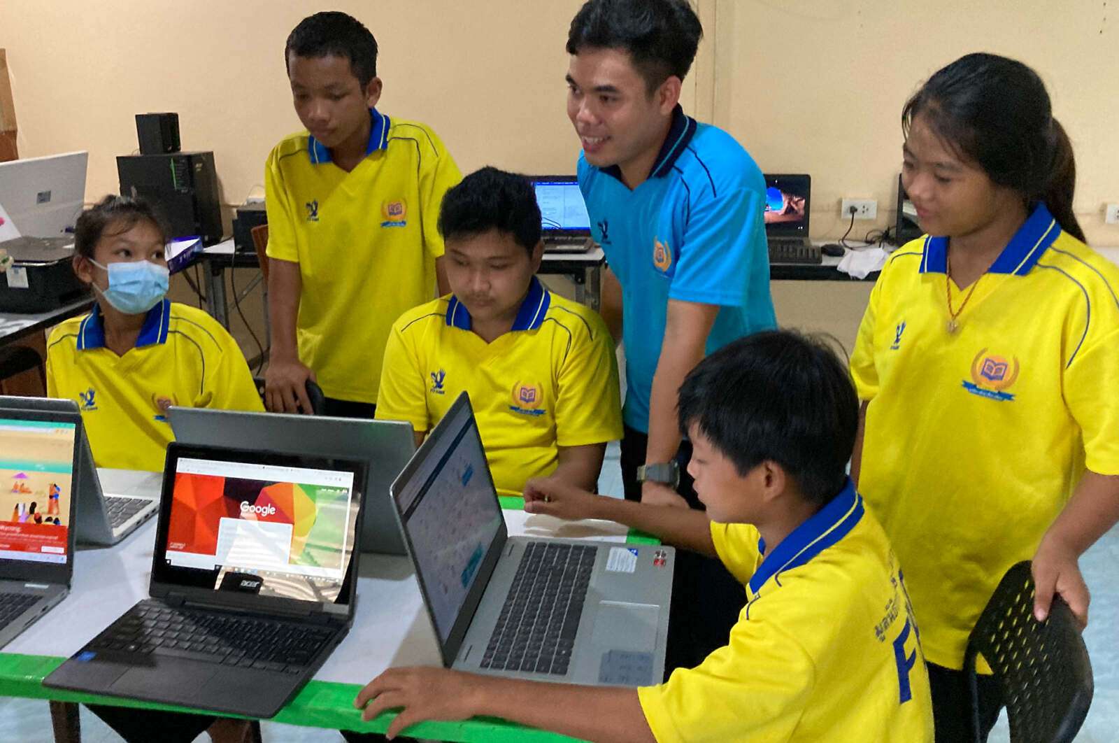 Children playing at a sponsored school