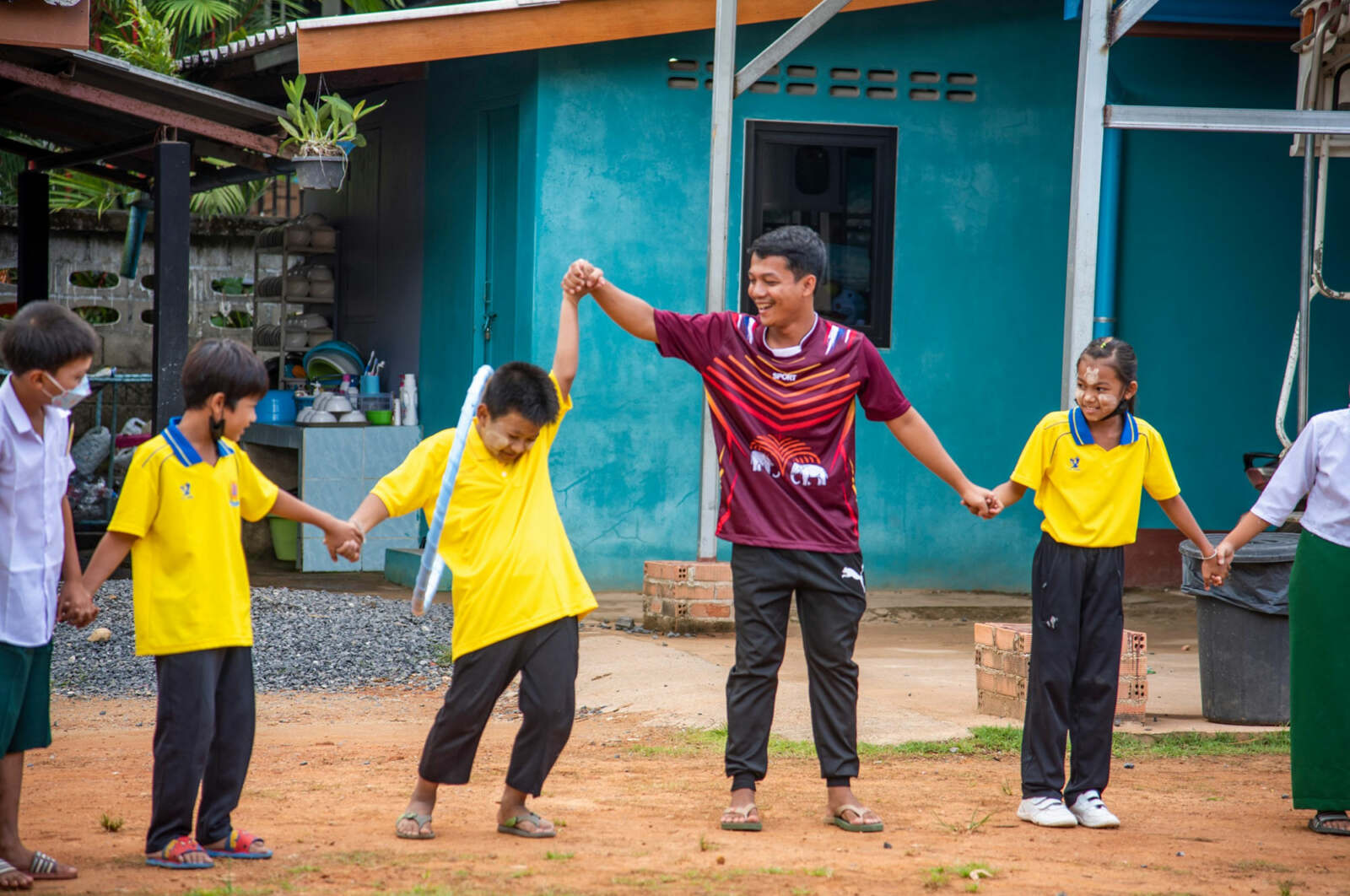 Children playing at a sponsored school