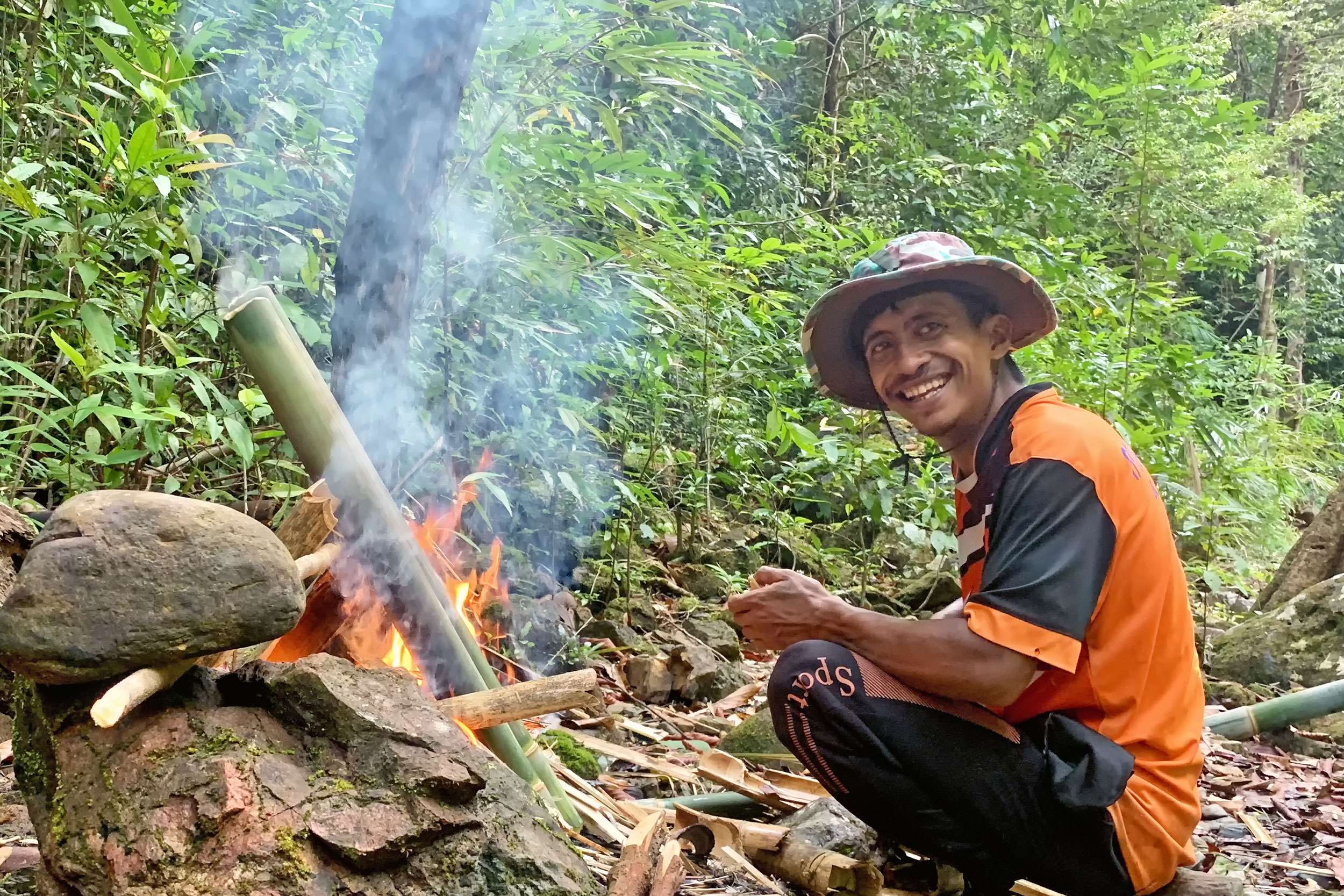 Cooking - jungle style with an open fire and using utensils gathered from the forest